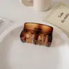 Pinza para el pelo de estrella con garra y estampado de leopardo estilo retro, dulce y fresca, para recogidos, pinza de acetato de gato y tiburón, accesorio de pelo elegante en forma de corazón