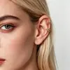 Aretes de Clip para Oreja Cruzados de Moda Retro Shein Transfronterizos Europeos y Americanos con un Toque de Lujo, Pendientes y Clips de Oreja Simples y Versátiles al por Mayor