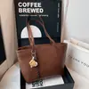 Bolsa Tote Grande Capacidade para Mulheres 2026 Primavera Novo Estilo Simples Versátil Bolsa de Mão Ombro Único Axila Trabalho Grande Bolsa