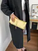 Bolsa de almacenamiento de moda transfronteriza 2026 bolsa de maquillaje portátil bolso de mano de lujo de alto valor bolsa para teléfono brillante moderna