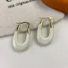 Pendientes Colgantes en Forma de U con Gota de Aceite Diseño de Nicho Pendientes de Moda Rojo Atmósfera de Año Nuevo Pendientes de Lujo Accesibles Pendientes para Mujeres