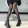 Medias de rejilla de seda negra con puntera hueca y cifrado de red Jacquard. Medias negras de rejilla europeas y americanas de moda con borde cruzado.
