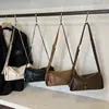 Bolso bandolera tipo baguette popular de este año para mujer 2025 Otoño Nuevo Casual Superficie Suave Moda Lujo Accesible Bolso de Hombro Cruzado