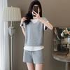 Traje Deportivo Casual Nuevo de Verano 2025 para Mujer, Nuevo Conjunto de Camiseta y Shorts de Dos Piezas Falsas Holgados de Verano