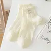 Calcetines cortos de encaje de color liso con lazo para mujer, calcetines de algodón de malla fina hueca transpirables que absorben el sudor de tubo medio para estudiantes