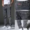 Jeans Casuales Ajustados de Estilo Coreano, Modernos, Elásticos, Negros y Grises para Hombre, Nuevos para Primavera/Verano 2026