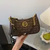 A bolsa pequena da moda deste ano para mulheres 2026 novo estilo bolsa de axila de celebridade da internet bolsa com corrente estampada bolsa versátil de ombro único transversal para mulheres
