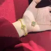 Collar de Trébol de Cuatro Hojas Hielo Triturado Dorado Edición Limitada de Año Nuevo Pulsera de Cinco Flores Doble Cara Escama de Dragón Hielo Triturado Suministro en Vivo