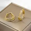 Brincos grandes argola plana entrelaçados estilo europeu e americano para mulheres, design torcido tricolor estilo francês, luxo leve, sensação de alta qualidade, item popular de nicho
