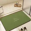 Alfombra de piso de baño absorbente de color sólido de lodo de diatomeas, simple y minimalista, felpudo de color sólido antideslizante y resistente a la suciedad para baño