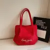 Bolsa de Lona Estilo Coreano Estilo Preguiçoso Grande Capacidade Letra Bordada 2025 Nova Textura Axila Estudante Bolsa de Ombro para Mulheres