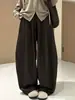 Pantalones anchos color marrón melardo para mujer, nueva colección otoño 2026, corte holgado, estilo boyfriend, cintura alta, adecuados para figuras petite, con detalles de pliegues