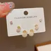 Bolsa da sorte de pérolas com design versátil e moderno estilo francês, conjunto de brincos de três peças, brincos elegantes e simples para o dia a dia para revenda