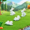 Figuras de animais de família de coelhos mais vendidas internacionalmente, decorações de paisagem em miniatura, acessórios DIY, enfeites de resina