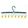 Perchero para secar ropa de colores con múltiples pinzas para uso en exteriores, pinza fija a prueba de viento para uso en casa, perchero de 8 pinzas para ropa interior y calcetines