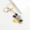 Llavero Colgante de Gato con Incrustaciones de Diamantes Creativo Europeo y Americano Lindo Dibujo Animado Mascota Colgante de Bolsa de Metal Venta al por Mayor