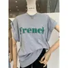 Camiseta Retrô Americana de Manga Curta para Mulheres, Novo Design Tendência Verão 2026, Top Soltinho Chique de Nicho, Moda Estilo Ins