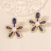 Pendientes de moda versátiles de diseño de alta gama de lujo ligero elegantes con flor de diamante perla transfronterizos nuevos pendientes pendientes pendientes