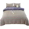 Disponível agora: Conjunto de cama de quatro peças com estampa floral retrô e visual de linho, incluindo um lençol e uma capa de edredom de algodão-linho lavado, conjunto de cama de luxo para atacado