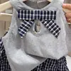 Niña Verano 2026 Nuevo Estilo Moderno y de Moda Chaleco sin Mangas con Lazo y Encaje Falda de Tartán Tipo Pastel