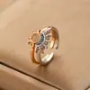Anel Aberto Cruzado Europeu e Americano Personalidade Simples Conjunto de Cobre Zircônia Sol e Lua Sobrepostos Anel de Casal Sol e Lua