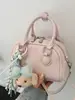 Bolso de mujer de diseño de nicho de alta gama transfronterizo, bolso de bolos, nuevo modelo 2026, un solo hombro, bandolera, bolso de mano, moderno