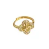 Anillo de Flor de Cuatro Hojas con Circonita Chapado en Oro de 18 Quilates Estilo de Lujo Accesible Retro de Nicho Anillo Abierto para Dedo Índice Joyería de Mano Medieval