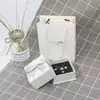 Caja de embalaje joyería una generación de productos pequeños al por mayor lote mixto agente para unirse la caja de regalo generación de regalos suministro directo