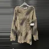 Suéter Coreano Feminino de Moda Nicho Loose Emagrecedor com Gola Redonda Rasgado Vintage Outono 2025