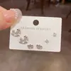Moda de Nicho Minimalista Año del Caballo Nuevo Juego de Pendientes de Tres Piezas de Caballo y Lingote Completamente Diamantado Pendientes Versátiles Exquisitos de Lujo Ligero para Mujer