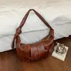 Moda 2026 Nova Bolsa de Bolinho Retro Versátil para Outono Bolsa de Axila Estilo Simples Versátil para o Dia a Dia Bolsa de Ombro Único Transversal