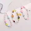 Lindo y fresco cordón para teléfono con cuentas de fresa, adecuado para todas las fundas de teléfono, correa de muñeca anticaída
