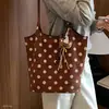 Bolsa de mão veludo bolinhas retrô nova grande capacidade mãe e filho textura da moda camurça bolsa coreana balde 2026 ombro único outono