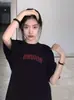 Camiseta de Manga Corta para Mujer Estilo Americano, Nuevo Modelo de Verano, Atuendo para Pareja, Estampado de Trébol, Top Negro de Talla Grande de Moda, Transfronterizo