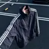 Jaqueta Bomber Listrada com Gola Alta e Patchwork Azul Escuro Masculina Outono Solta Casual Versátil Top Estilo Streetwear Americano Peça de Roupa Cool