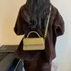 Bolso de mano pequeño cuadrado para mujer transfronterizo 2026 nuevo bolso de hombro de moda bolso de mano con un patrón tejido de alta gama bolso cruzado