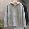 Cárdigan de punto con capucha calada para hombre, chaqueta de pareja para primavera y otoño, prenda exterior de moda desgastada, venta al por mayor transfronteriza