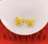 Suministro en vivo cobre dorado moda Joker lazo rosa fresco gancho recto una variedad de pendientes joyería pendientes al por mayor