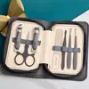 Set de 9 Piezas de Herramientas de Acero Inoxidable para Manicura y Cuidado de Uñas, Set de Tijeras para Uñas, Tijeras Completas para Cejas, Cuchara para Oídos, Set de Cortauñas al por Mayor