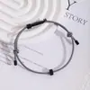 Cuerda de Mano de Carburo de Tungsteno Simple Europea y Americana Transfronteriza Engranaje Rompeventanas de Escape de Emergencia Pulsera Ajustable Joyería para Hombres y Mujeres Venta al por Mayor
