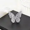 Anillo al por mayor puesto de suministro de joyería en Yiwu vendiendo anillo de mariposa hueco anillo exagerado pulsera r7146