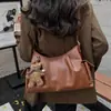 Bolso de mujer de alto valor, gran capacidad, nuevo bolso casual retro elegante de invierno 2026, bolso de mano, para ir al trabajo, bolso almohada