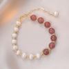 Pulsera femenina pulsera de cristal fresa diseño nicho ins pulsera simple elegante simple flor de durazno perla barroca