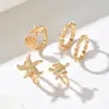 Conjunto de anillos de concha y estrella de mar estilo resort francés, combinación de anillos de la serie oceánica simple y lujosa, joyería de moda