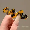 Fase incómoda para el temperamento de pelo corto pinza de resorte chica parte posterior de la cabeza pinza para pelo liso pelo pinza para pelo no presiona la cabeza pinza para pelo semi-recogido
