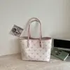 Bolsa Tote para Viajes Diarios para Mujer 2026 Nuevo Estilo de Verano Lujo Ligero de Gama Alta Bolso de Hombro de Nicho Bolso de Mano de Gran Capacidad