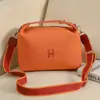 Bolso nuevo para mujer 2024 estilo ins, bolso de lona de color liso, gran capacidad, neceser simple, bolso cruzado artístico de un solo hombro estilo coreano
