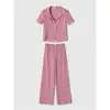Fabricante de ropa para mujer transfronterizo al por mayor 2026 nuevo conjunto casual de chaqueta y pantalón de manga corta con cuello en V y textura primavera-verano
