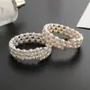 Pulseira de Moda Europeia e Americana Fio de Aço Elástico Pérola Diamante Pulseira Multicamadas Joia de Mão para Noiva Fabricante Feminino Atacado B329