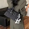 Bolso de lunares a la moda, modelo nuevo y simple, bolso de hombro único de nicho de moda para el día a día, versión coreana 2026, bolso de axila para mujer con diseño elegante